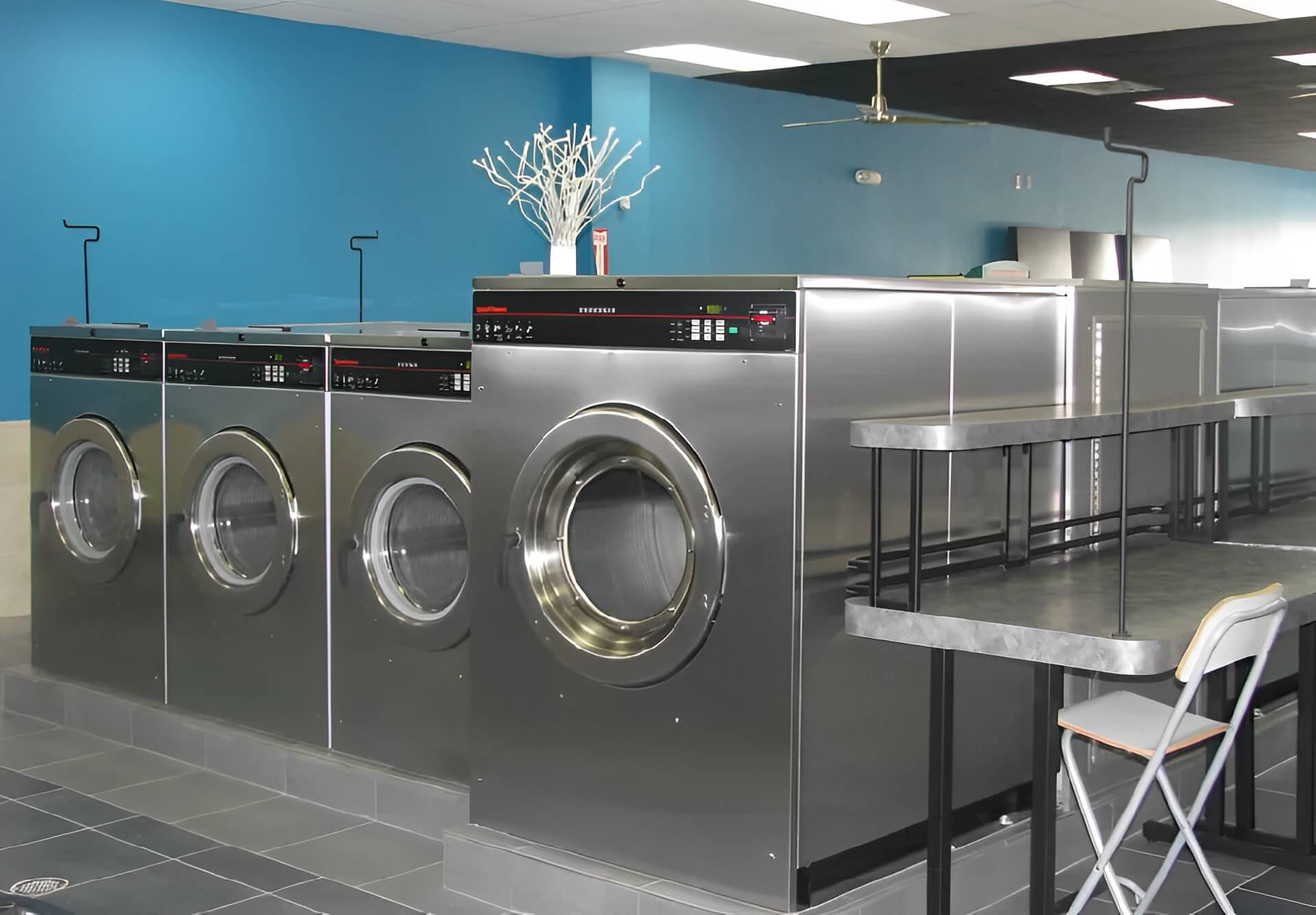 Row of high-capacity commercial dryers at Rose Hill Wash