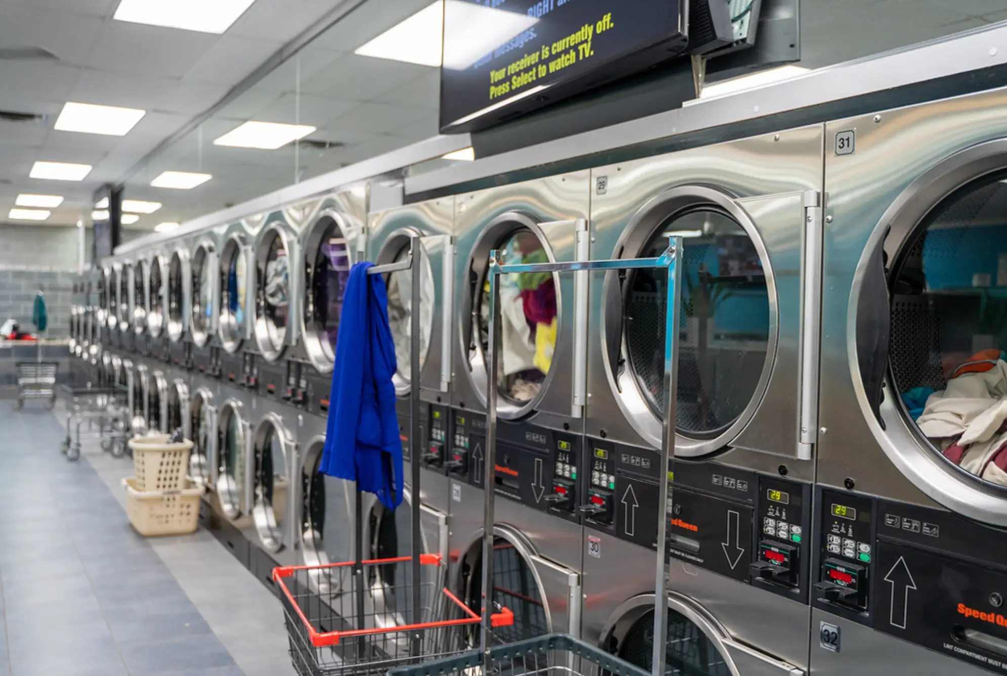 Large capacity commercial washers at Rose Hill Wash laundromat