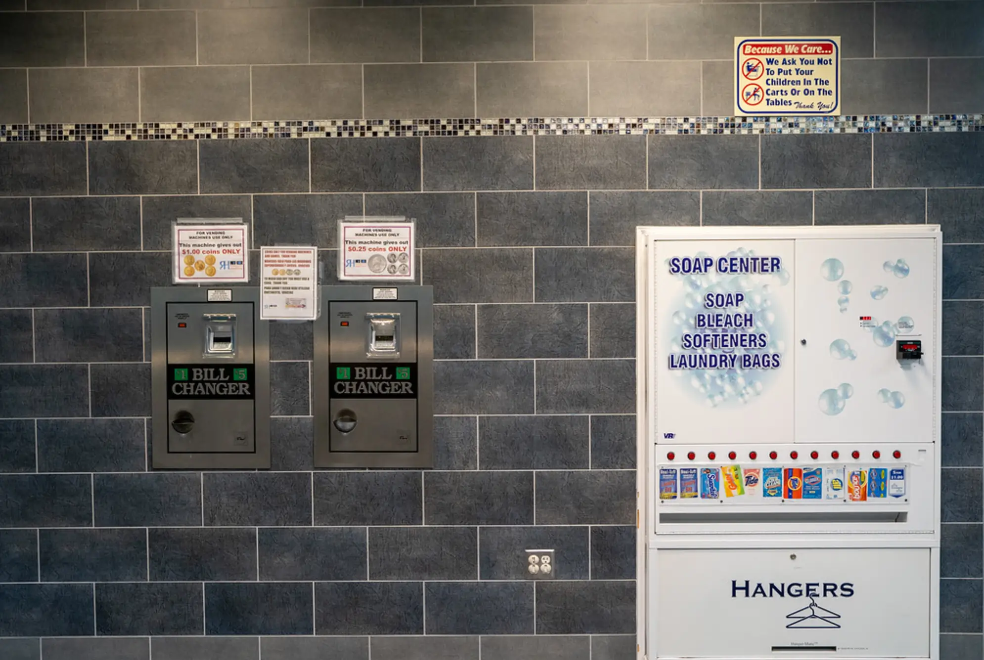 On-site coin and bill changer machine at Rose Hill Wash laundromat