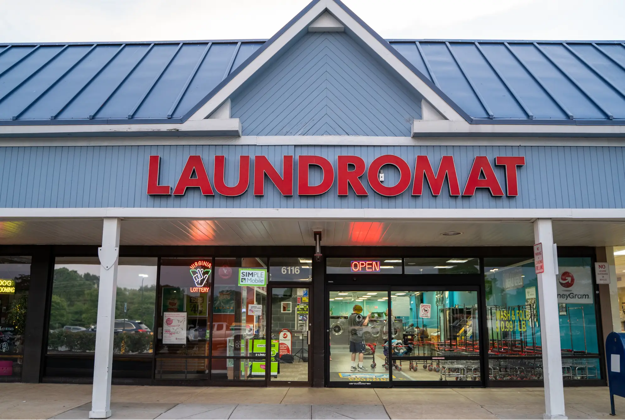 Exterior entrance view of Rose Hill Wash laundromat facility