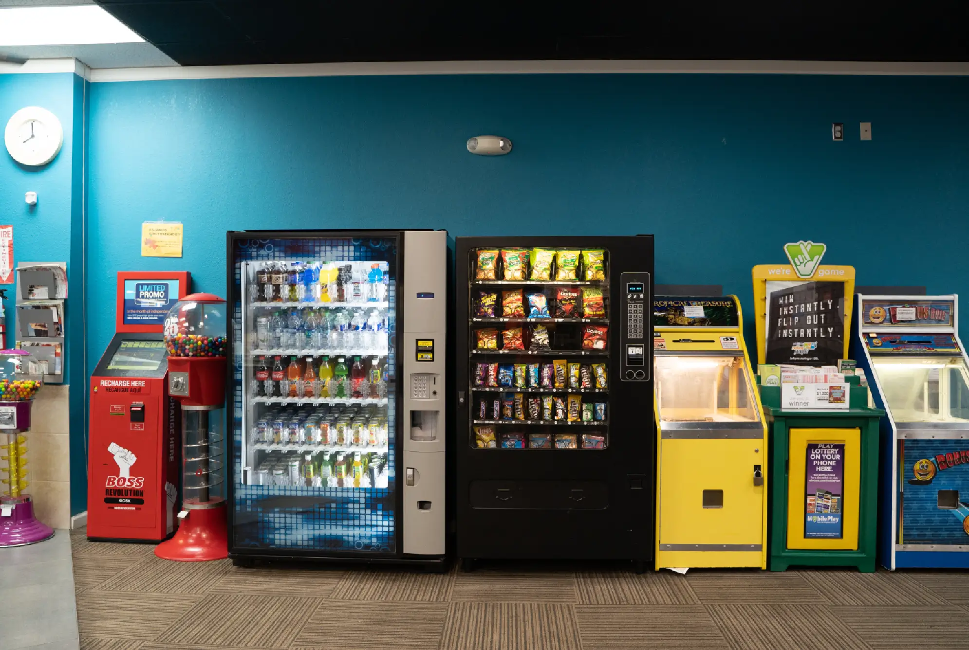 Snack and drink vending machines available at Rose Hill Wash laundromat